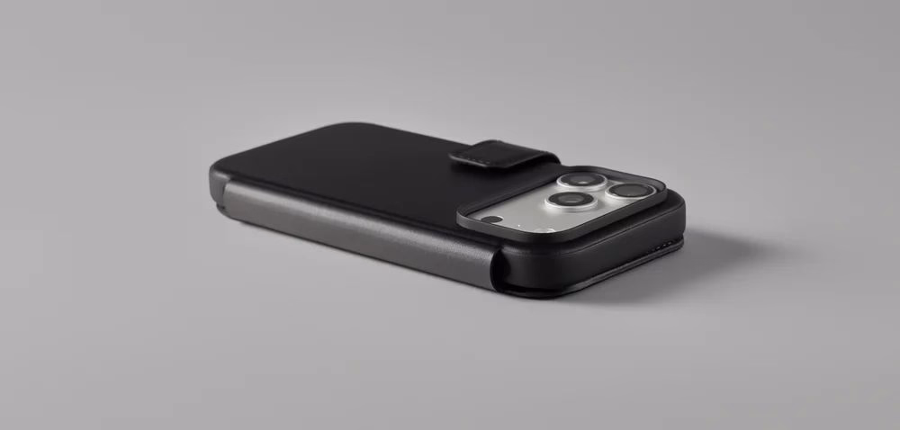 Чехол Nomad Modern Folio Camino (Black) лежит на сером фоне